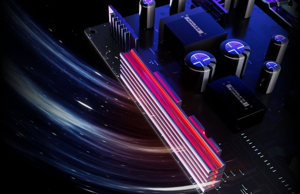 Monitor ASUS ROG Swift PG32UCDM Zbliżenie układu elektronicznego z elementami chłodzenia z podświetlonymi czerwonymi i niebieskimi akcentami świetlnymi oznaczającymi przepływ powietrza, radiator, chłodzenie, wentylacja, grafenowa powłoka