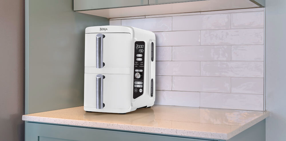 AIR FRYER NINJA NINJA SL400EUWH (DOUBLESTACK XL) (BIAŁY) 2 szuflady dwie pionowo ułozone szuflady zajmują mniej miejsca 6 funkcji gotowania czas temperatura dwie niezależnie sterowane szuflady potrawy gotowe jednocześnie