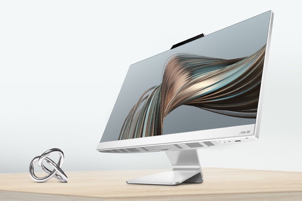 Komputer ASUS E3402WVAK-WPC043X Komputer AiO ASUS z ekranu ukazującego perkusistę podczas występu, widoczny z perspektywy bocznej i lekko od dołu, typ, przeznaczenie, cechy, zalety