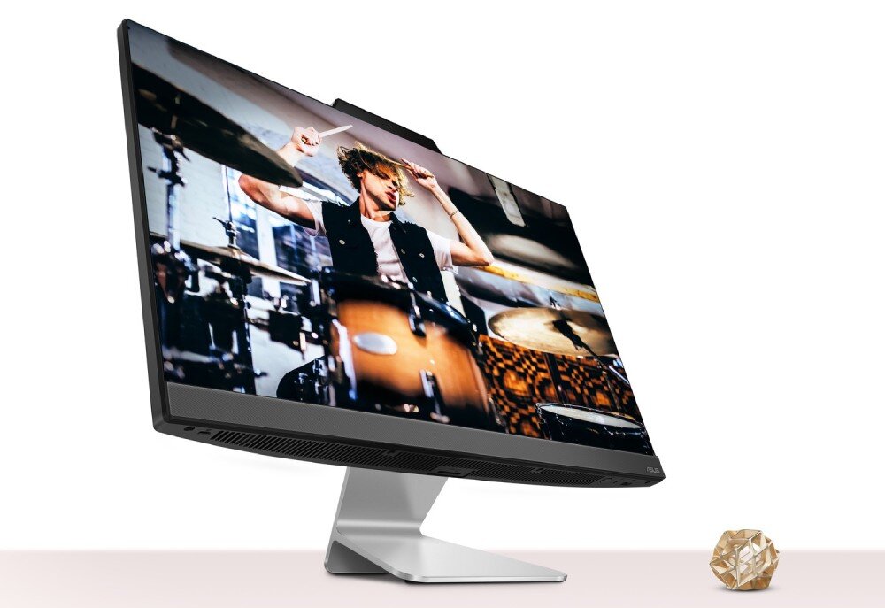 Komputer ASUS E3402WVAK-WPC043X Komputer AiO ASUS ustawiony na biurku, widoczny pod kątem z boku z ekranem wyświetlającym abstrakcyjny wzór, podzespoły, procesor, pamięć RAM, dysk