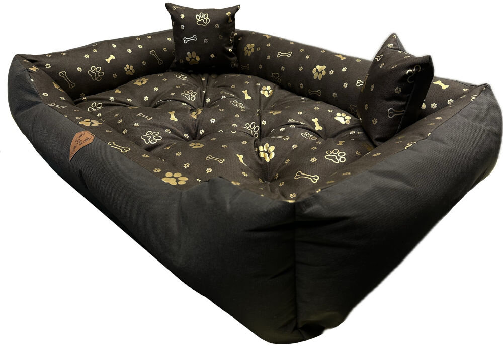 Legowisko dla psa OSKAR Premium Zdjęcie produktu przedstawiające puste, ciemne legowisko dla psa, z wysokimi brzegami i wnętrzem pokrytym metalicznym, złotym wzorem łap i kości. W legowisku znajdują się dwie małe poduszki.