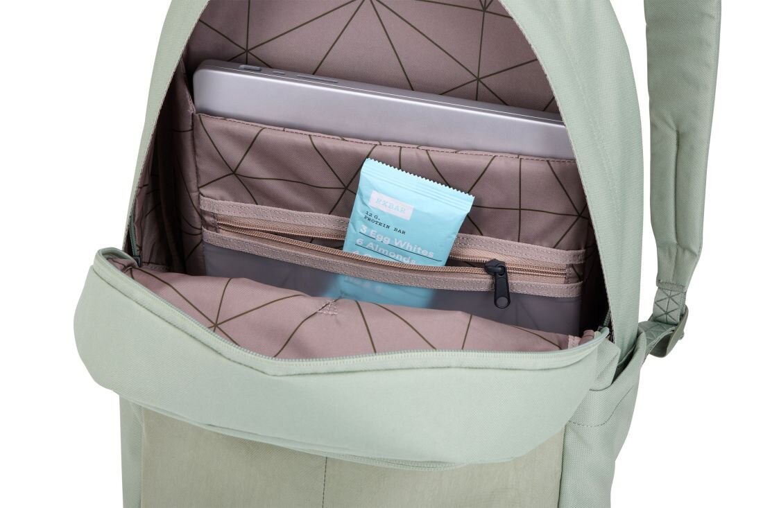 Plecak Thule Gauntlet Sleeve z przegrodą na laptop pokazuje wewnętrzną kieszeń z zamkiem podczas organizacji akcesoriów do pracy mobilnej 