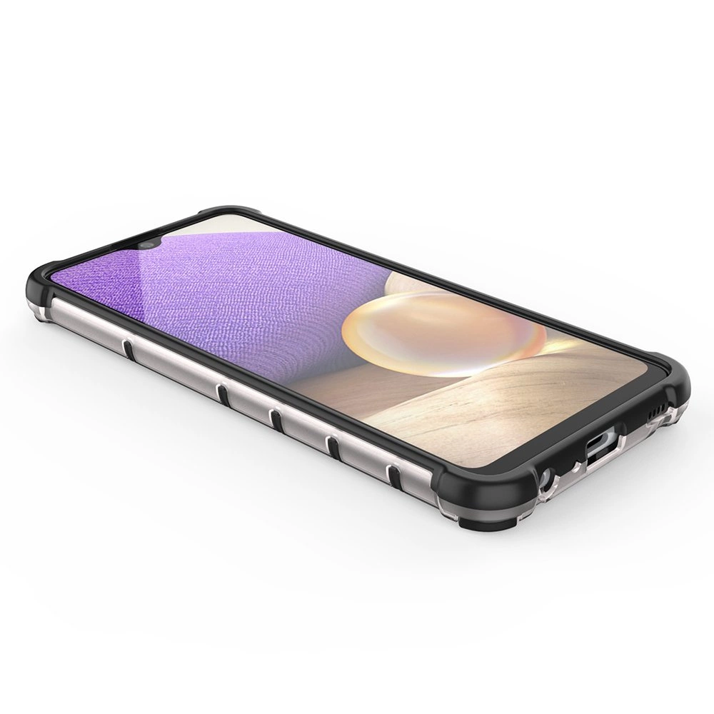 Na obrazie widoczny jest smartfon w przezroczystym etui z czarnymi wzmocnieniami na rogach. Ekran telefonu wyświetla abstrakcyjny wzór z fioletowym i beżowym elementem.