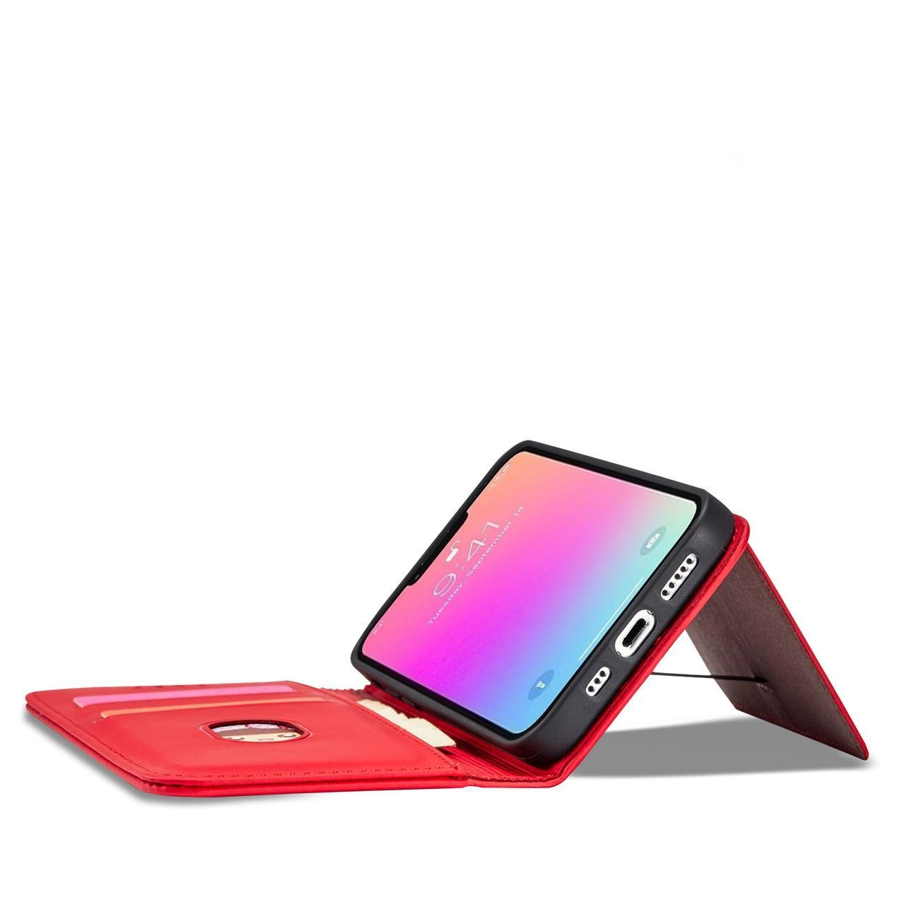 Czerwone etui na telefon z klapką, pełniące funkcję podstawki, z miejscem na karty. Telefon w etui wyświetla ekran z gradientowym tłem i godziną 9:41.