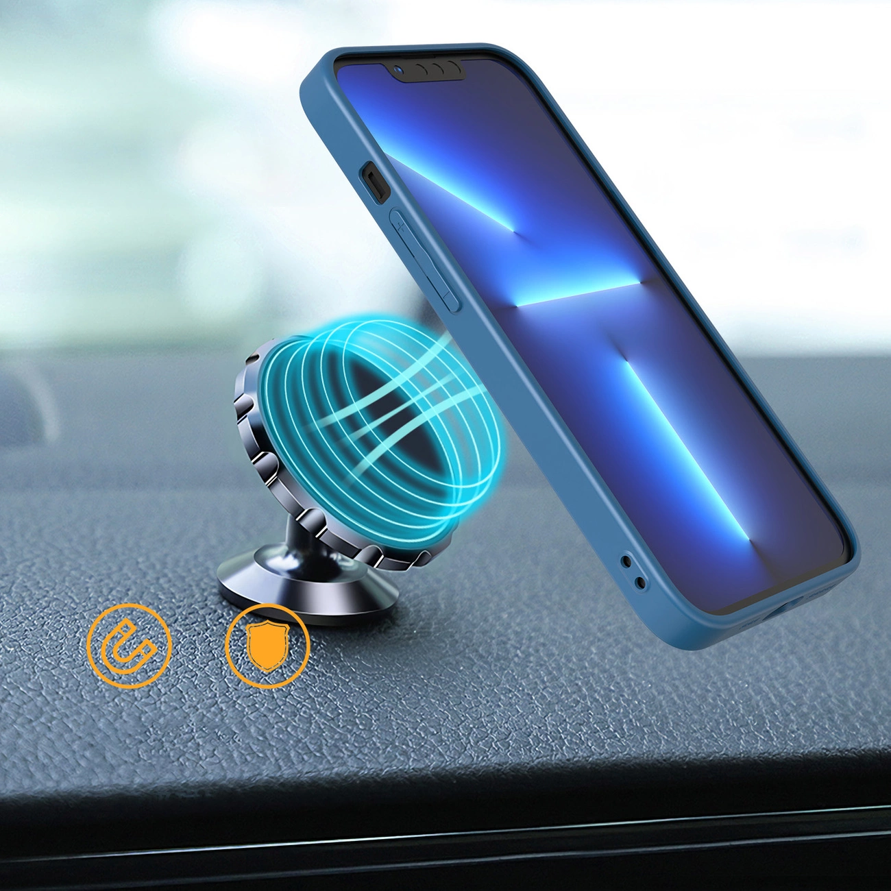 Obraz przedstawia telefon w niebieskim etui zamocowany na magnetycznym uchwycie na desce rozdzielczej. Widać także dwa symbole: magnesu i tarczy ochronnej.