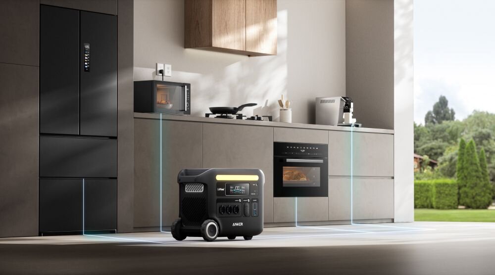 Stacja zasilania ANKER Solix F2600 2560 Wh 2300W, warsztat, zasialnie, istotne, możliwości, stacja stoi na podłodze w kuchni wśród sprzętu AGD