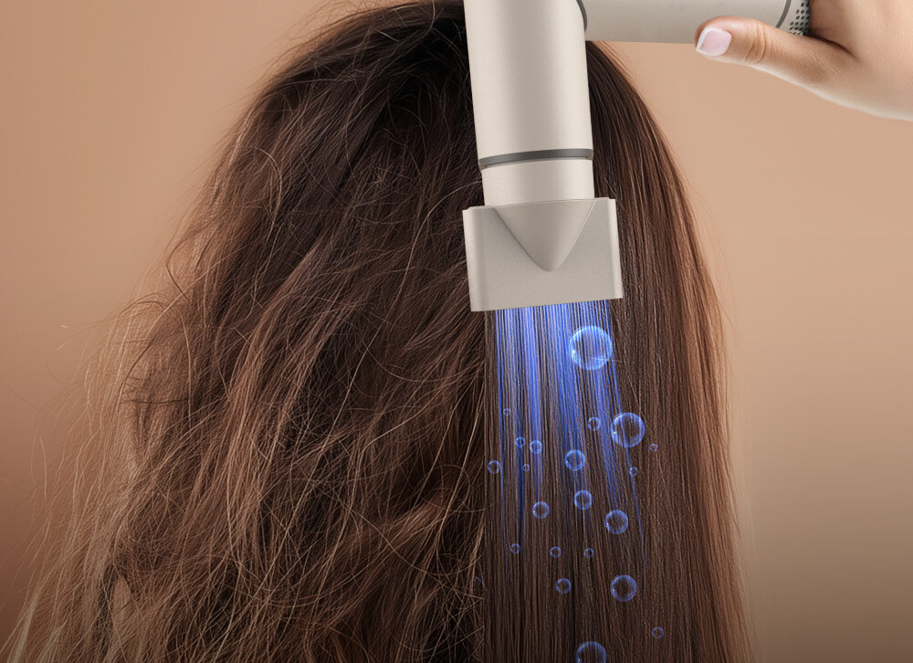 Suszarko-lokówka AENO HS1 Technologia jonowa jonizacja redukuje elektryzowanie się włosów wpływa na ich strukturę gładkie, miękkie i zdrowo wyglądające pasma Profesjonalne wykończenie fryzury