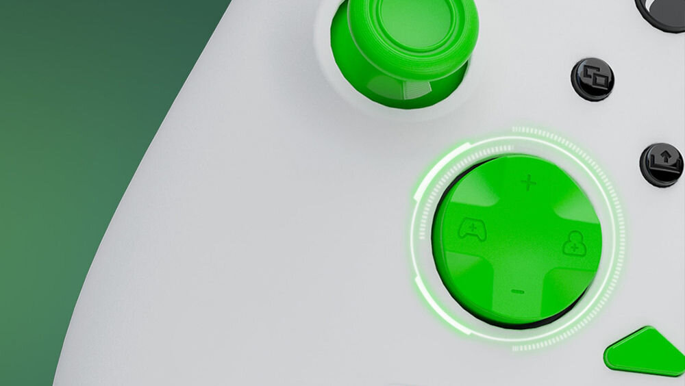 Kontroler TURTLE BEACH Rematch Core Biało-zielony zbliżenie na przyciski systemu zarządzania dźwiękiem regulacja głośności bez potrzeby wchodzenia w menu skupienie na rozgrywce