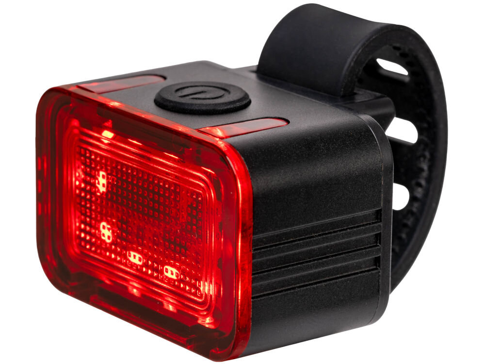 Lampka rowerowa S-LINE BL602 tylna 300 lm czerwone światło wymiary 103x30.2x40.9 mm do jazdy miejskiej i dojazdów do pracy Tylna lampka rowerowa LED S-Line BL602 z gumowym uchwytem montażowym. Produkt ma czarną obudowę, czerwony klosz świecący intensywnym światłem oraz widoczny przycisk zasilania na górze.