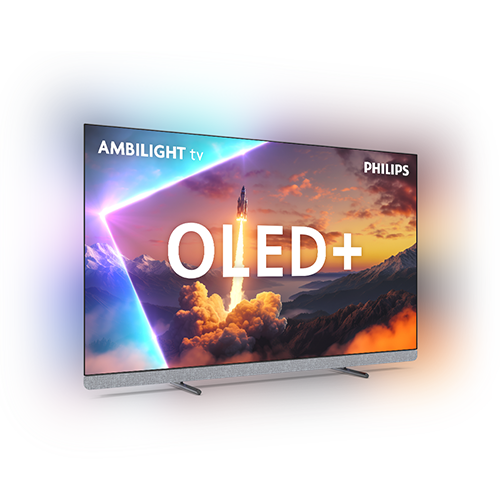 Telewizor z napisem \'OLED+\' na ekranie, wyświetlający obraz startującej rakiety na tle kolorowego nieba. Widoczne są napisy \'AMBILIGHT tv\' i \'PHILIPS\'.