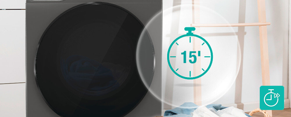 Pralko-suszarka GORENJE G600 WD2PA964ADT/PL Ujęcie fragmentu ciemnej pralko–suszarki pokazuje duże, przyciemniane drzwi, obok których widoczna jest jasna przestrzeń pralni z koszem pełnym ubrań. Na środku dodano półprzezroczystą grafikę ze stoperem i oznaczeniem „15’”, a w prawym dolnym rogu turkusową ikonkę zegara, co podkreśla ultrakrótki, 15‑minutowy program odświeżania szybkie pranie 15 minut błyskawiczne odświeżenie lekkie zabrudzenia codzienna odzież