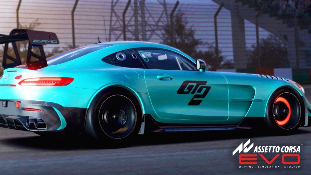 Monitor DELL Alienware AW3425DW Zbliżenie na ekran pokazujący tył turkusowego samochodu sportowego jadącego po torze wyścigowym