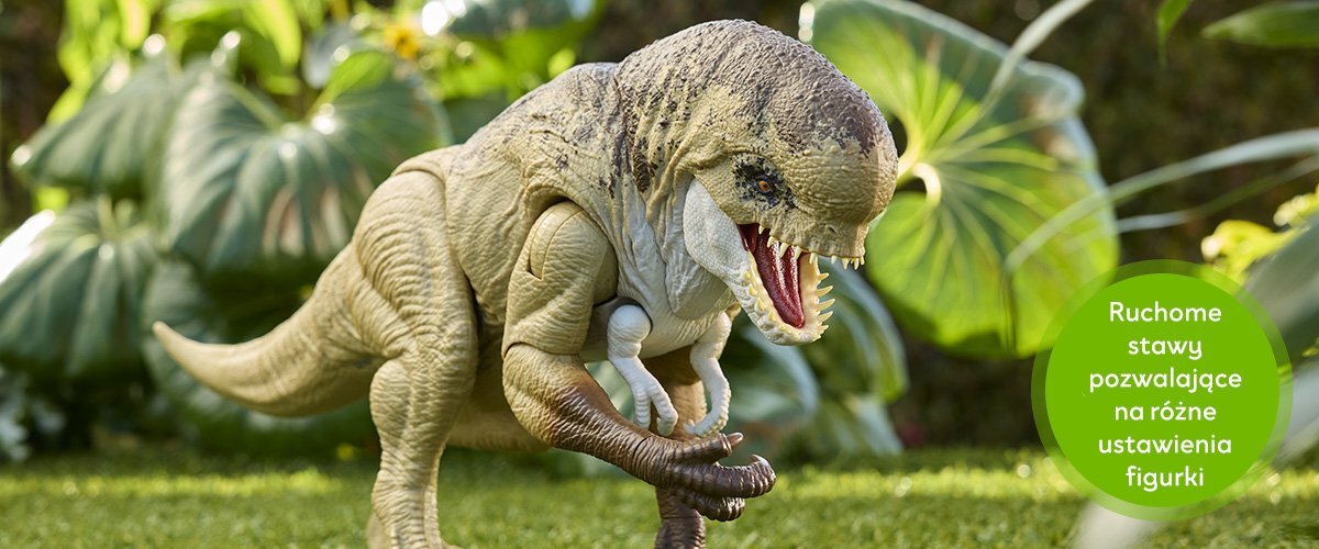 Figurka dinozaura na tle zieleni, z otwartą paszczą i widocznymi zębami. Na obrazie znajduje się zielone kółko z tekstem: \'Ruchome stawy pozwalające na różne ustawienia figurki\'.