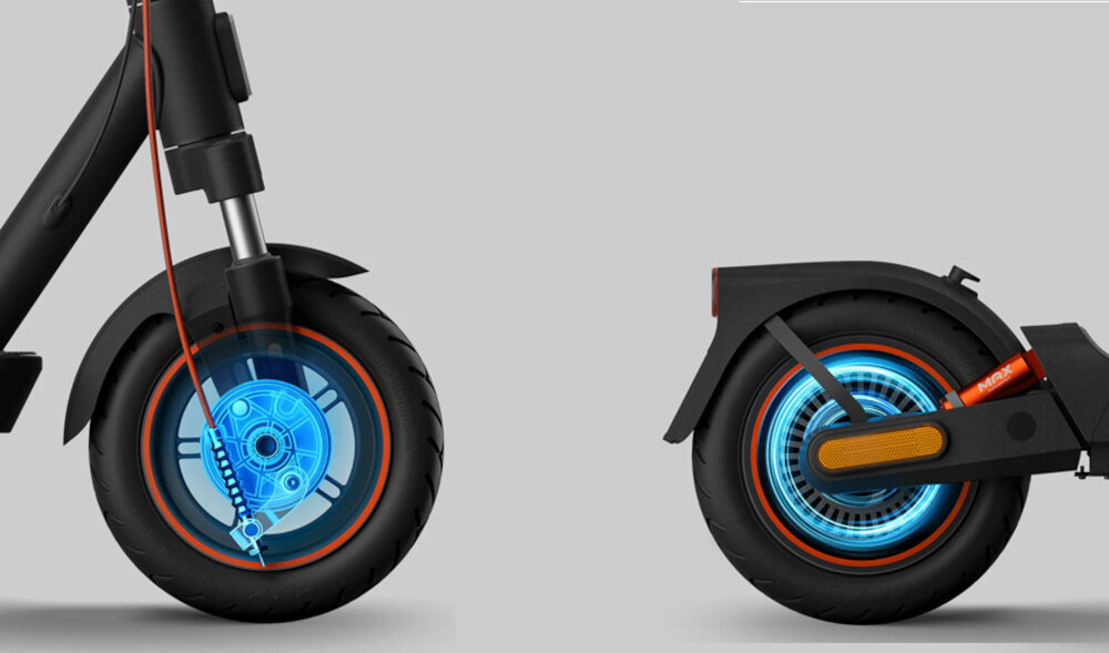 Hulajnoga elektryczna XIAOMI Scooter 5 Max 60km 400W 10 cali Czarny zbliżenie na koła podświetlone hamulce w przednim i tylnym kole bezpieczeństwo podwójny system hamulcowy przedni hamulec bębnowy tylny system E-ABS duża siła hamowania system E-ABS zapobiega blokowaniu się kół podczas hamowania