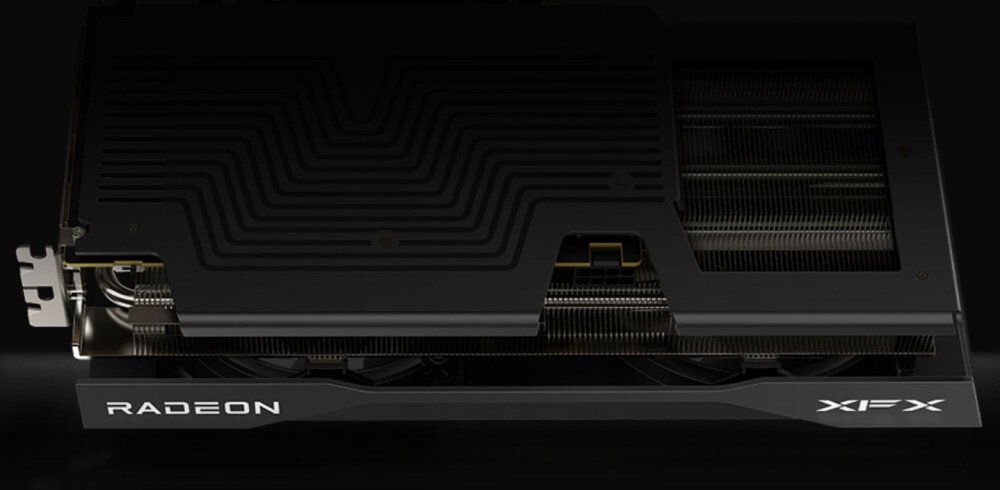 Karta graficzna XFX Swift Radeon RX 9060 XT OC Gaming Edition 16GB Górny widok na kartę graficzną pokazujący aluminiowe żebra radiatora oraz logo 'RADEON' i 'XFX' na boku obudowy, wygląd, obudowa, design