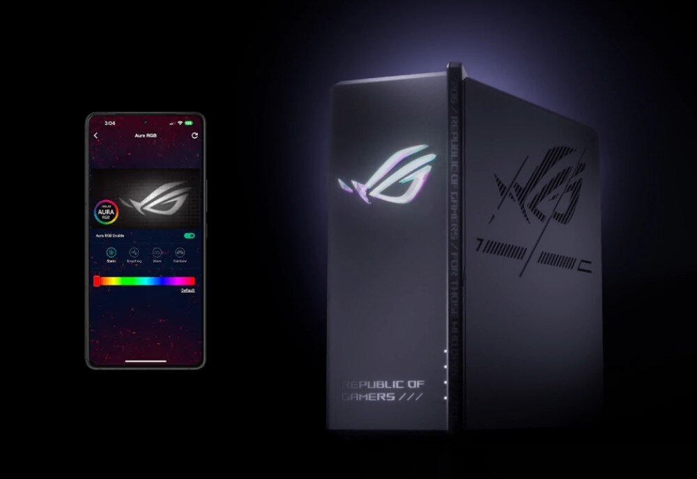 Router ASUS ROG Strix GS-BE18000 Czarne urządzenie z podświetlanym logo na froncie stoi obok smartfona z aplikacją do sterowania efektami świetlnymi, na tle ciemnej sceny, podświetlenie, wygląd