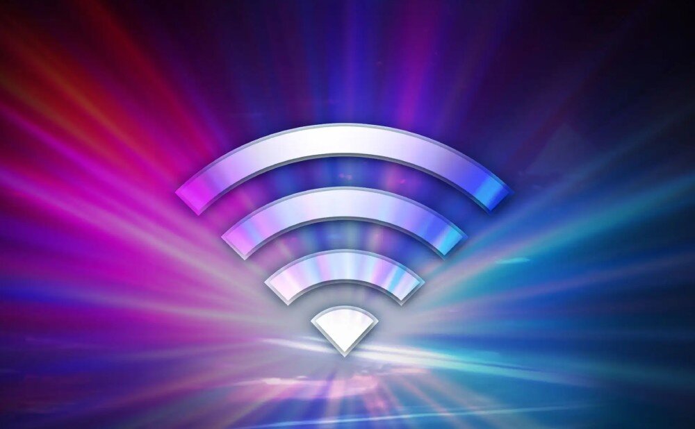 Komputer MSI MPG Infinite X3 AI 2NVR7-036EU Symbol Wi-Fi w odcieniach fioletu i błękitu, umieszczony na tle z promieniami świetlnymi rozchodzącymi się promieniście od środka, łączność Wi-Fi, złącze LAN, Bluetooth