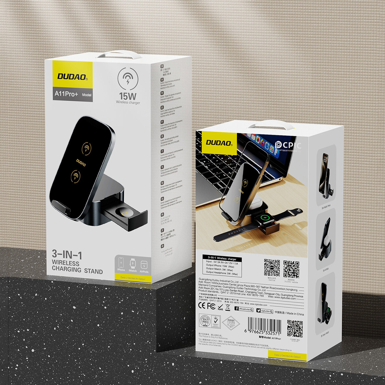 Na obrazie widoczne są dwa pudełka produktu \'Dudao A11Pro+ 3-IN-1 Wireless Charging Stand\' o mocy 15W. Pudełka przedstawiają ładowarkę indukcyjną oraz jej zastosowanie do ładowania telefonu, smartwatcha i słuchawek.