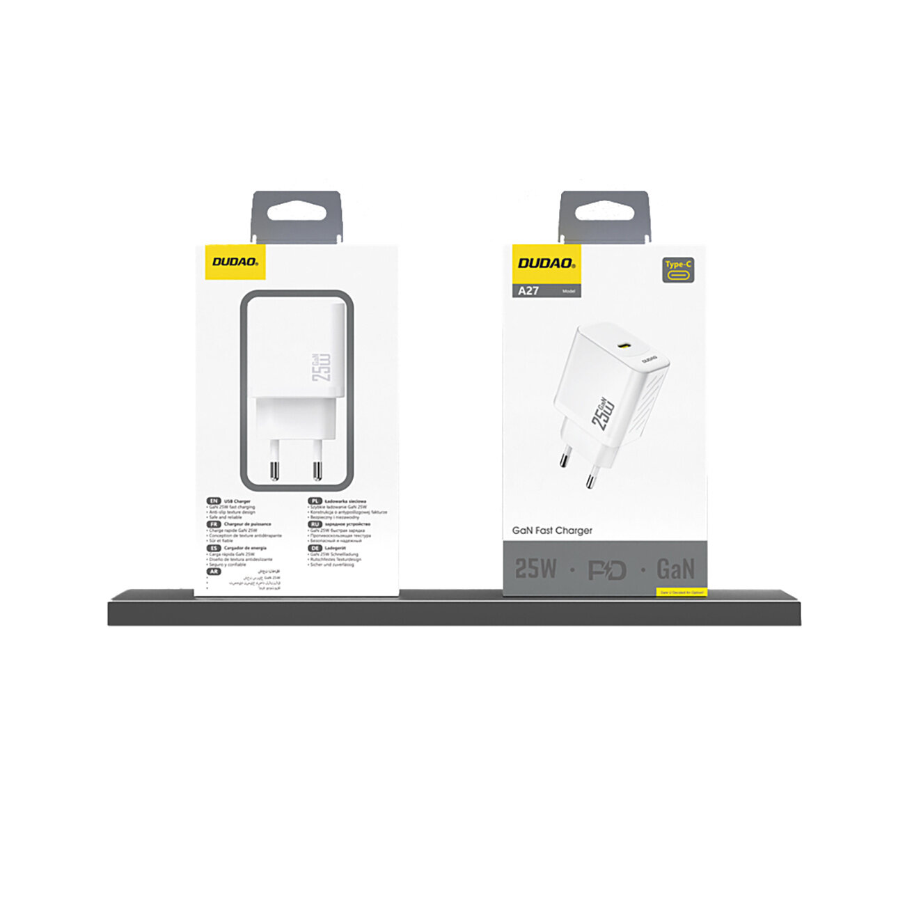 Na obrazie widoczne są dwa opakowania ładowarki sieciowej Dudao A27 25W GAN USB-C w kolorze białym. Opakowania mają żółte logo Dudao i napis \'25W\' na froncie.
