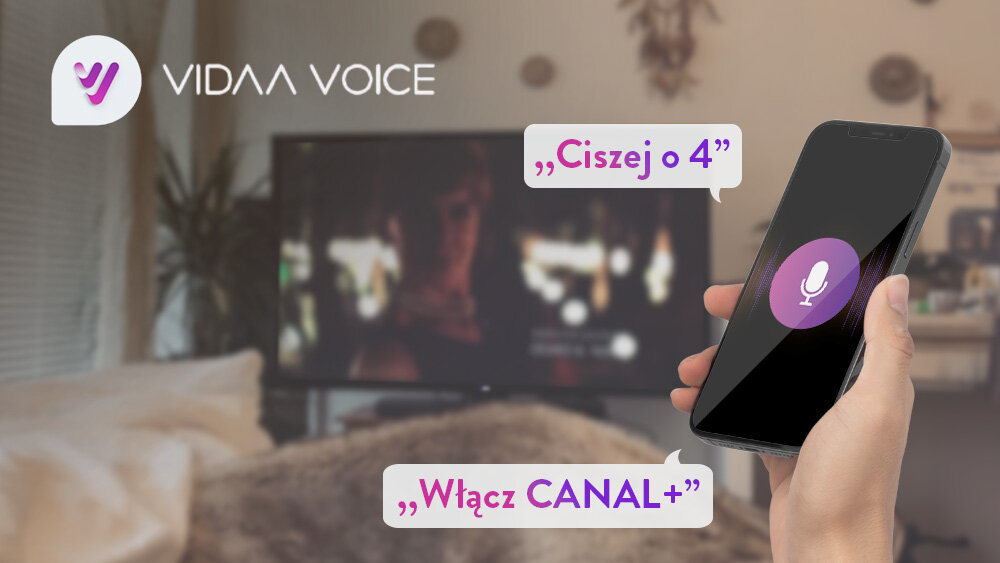 Telewizor JVC LT-32VQF550D - Głosowa obsługa VIDAA Voice, ręka trzymająca telefon z uruchomioną aplikacją VIDAA Voice