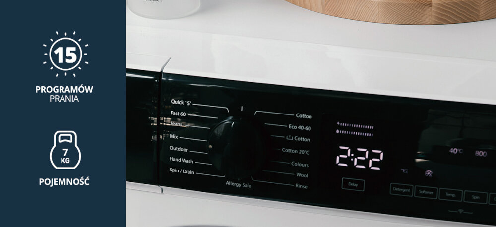Pralka VESTFROST VW-FW4B1270EU Na zdjęciu widoczny jest panel sterujący pralki Vestfrost z ręką ustawiającą program, a obok grafiki informujące o 15 programach prania i maksymalnej pojemności 10 kg. Urządzenie wyróżnia się nowoczesnym designem i wygodną obsługą 15 programów prania szybkie pranie delikatne pranie cykl wełna odświeżanie 15 minut pranie jeans pranie outdoor pranie pościeli pranie dziecięce