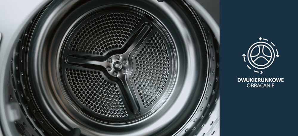 Suszarka VESTFROST VT-FD42HN90EU Na zdjęciu znajduje się suszarka Vestfrost o ciemnym froncie, ustawiona we wnętrzu z betonu i czarną zabudową. Po lewej stronie widnieje grafika wskazująca na funkcję dwukierunkowego obracania bębna, która pozwala równomiernie i skutecznie suszyć odzież dwukierunkowe obracanie bębna równomierne suszenie brak zbijania się ubrań przeciw skręcaniu ubrań równy efekt suszenie bez wilgotnych miejsc