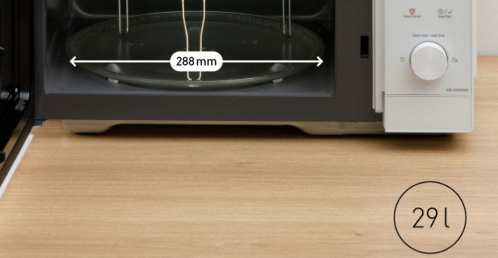 KUCHNIA MIKROFALOWA PANASONIC NN-GD34QWEPG Wnętrze kuchenki mikrofalowej z okrągłym talerzem obrotowym; nad talerzem strzałka z podpisem „288 mm” po kazuje średnicę, a w prawym dolnym rogu grafika z pojemnością urządzenia „29 l” kompaktowe wymiary 495x378x292 mm duża pojemność 29 l talerz obrotowy 288 mm oszczędność miejsca 20% więcej przestrzeni model GD34 Panasonic funkcja grilla maksymalne wykorzystanie blatu