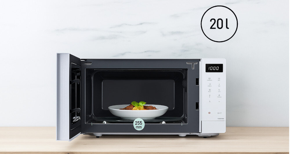 KUCHNIA MIKROFALOWA PANASONIC NN-ST21QWEPG front otwarta wnętrze talerz obrotowy pojemność 20 litrów wymiary Kompaktowa niewielka