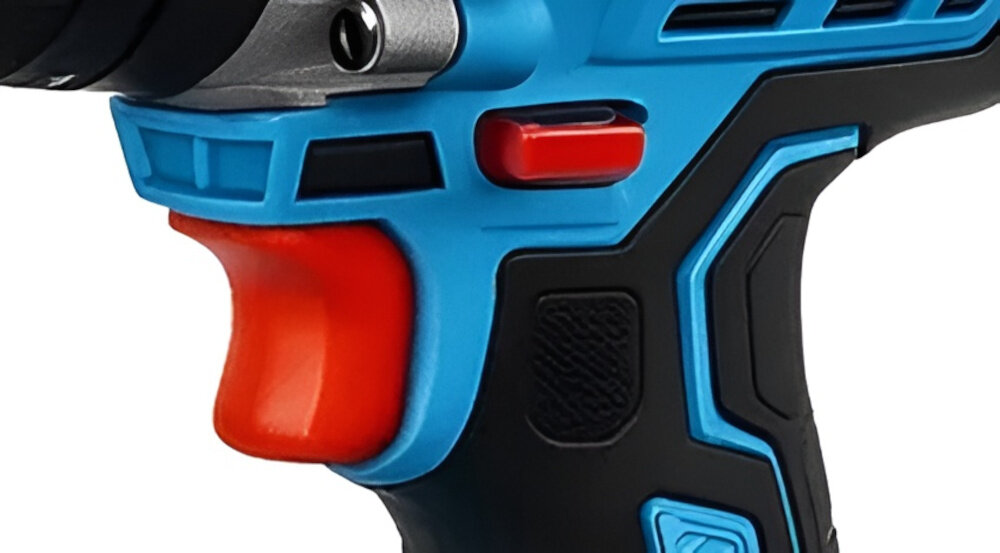 Wiertarko-wkrętarka POWERLINK PWL-06 zbliżenie na przełącznik zmiany kierunku wytrzymała konstrukcja wysokiej jakości materiały możliwość wiercenia w drewnie, tworzywach sztucznych stali oraz betonie (częstotliwość udaru do 21600 uderzeń na minutę) funkcja zmiany kierunku ułatwia korygowanie błędów montażowych