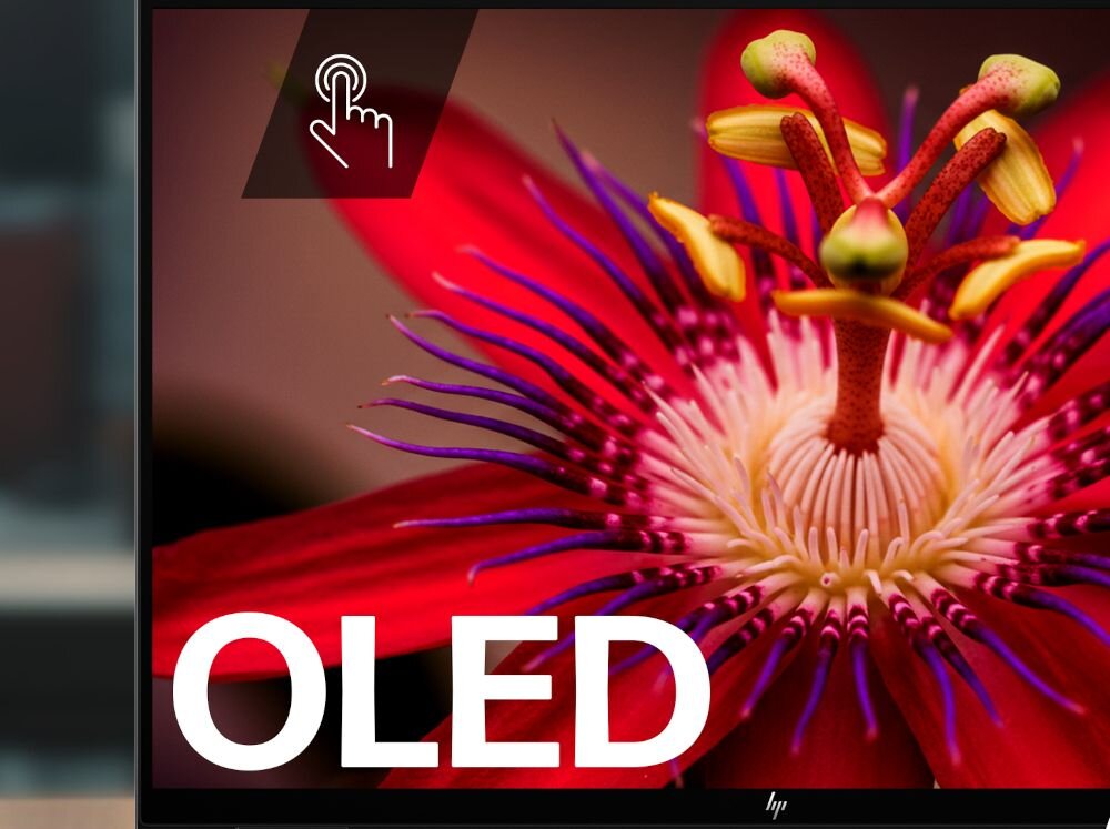 Zbliżenie ekranu OLED laptopa HP OmniBook, wyświetlony intensywnie czerwony kwiat oraz ikona dotyku. - Ekran dotykowy OLED 3K (2880 x 1800 px)