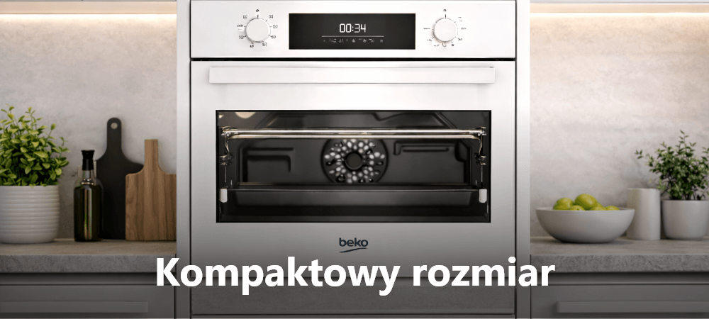 PIEKARNIK BEKO BBCM18300W Piekarnik do zabudowy marki Beko w ciemnej kuchni, z podświetlonym wnętrzem i panelem sterowania u góry (widoczne ustawienia czasu i temperatury). Po bokach znajdują się dekoracyjne elementy, takie jak deski do krojenia, roślina i miska z owocami. Na dole widnieje napis „Kompaktowy rozmiar”, podkreślający niewielkie wymiary urządzenia kompaktowe wymiary zabudowa małe kuchnie oszczędność miejsca