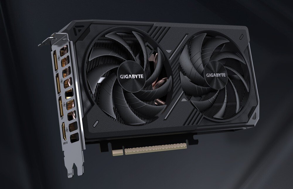 Karta graficzna GIGABYTE GeForce RTX 5060 Ti Windforce Max OC 8GB Karta graficzna widoczna z perspektywy lotu ptaka, ukazująca dwa wentylatory oraz górną krawędź obudowy z napisem GEFORCE RTX, opis