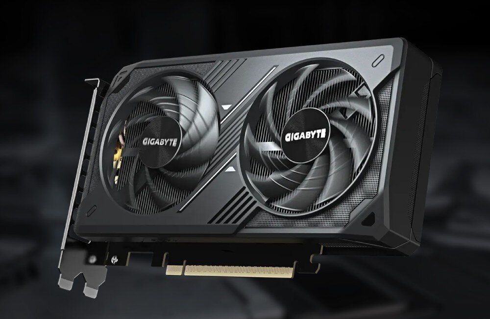 Karta graficzna GIGABYTE GeForce RTX 5060 Windforce Max OC 8GB Front karty graficznej z dwoma wentylatorami w czarnej obudowie z geometrycznymi wzorami i widocznym metalowym śledziem montażowym, tryb półpasywny, głośność