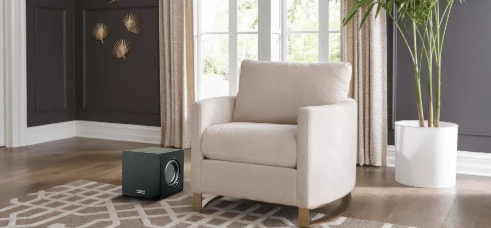 Subwoofer VELODYNE MiniVee X 8 wzmacniacz klasy D moc 800 W dynamiczny bas, subwoofer stojący na ziemi przy fotelu