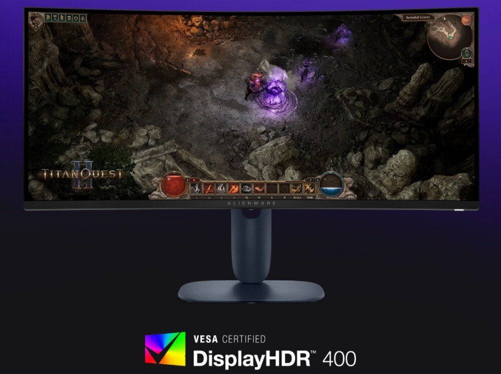 Monitor DELL Alienware AW3425DWM Monitor wyświetlający ciemną lokację z gry z fioletowymi efektami magicznymi, a pod nim logo certyfikatu VESA DisplayHDR 400