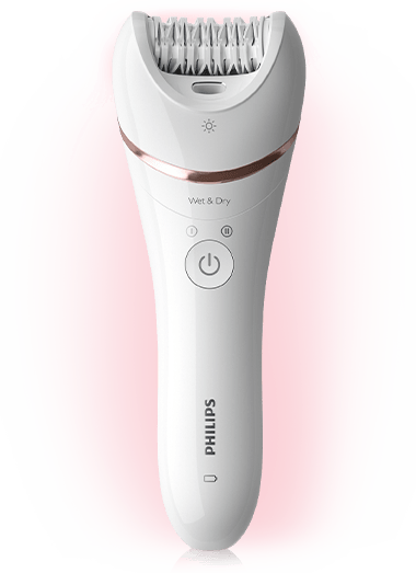 Biały depilator z napisem \'PHILIPS\' i przyciskiem zasilania na środku. Widoczny jest napis \'Wet & Dry\' oraz symbol światła nad głowicą depilującą.