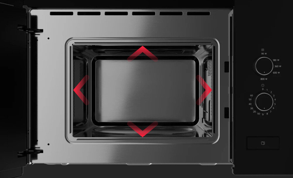 KUCHENKA MIKROFALOWA TEKA ML 820 FI BK Zdjęcie przedstawia wnętrze kuchenki mikrofalowej z otwartymi drzwiczkami, ukazane centralnie, z czerwonymi strzałkami wskazującymi na przestrzeń roboczą komory. Metaliczne ściany i dno urządzenia podkreślają jego pojemność oraz konstrukcję ułatwiającą równomierne podgrzewanie kompaktowy rozmiar pojemność 20 L litrów urządzenia praktyczne urządzenie domowe pełna funkcjonalność sprzętu mała przestrzeń gotowanie wygodne przygotowywanie posiłków