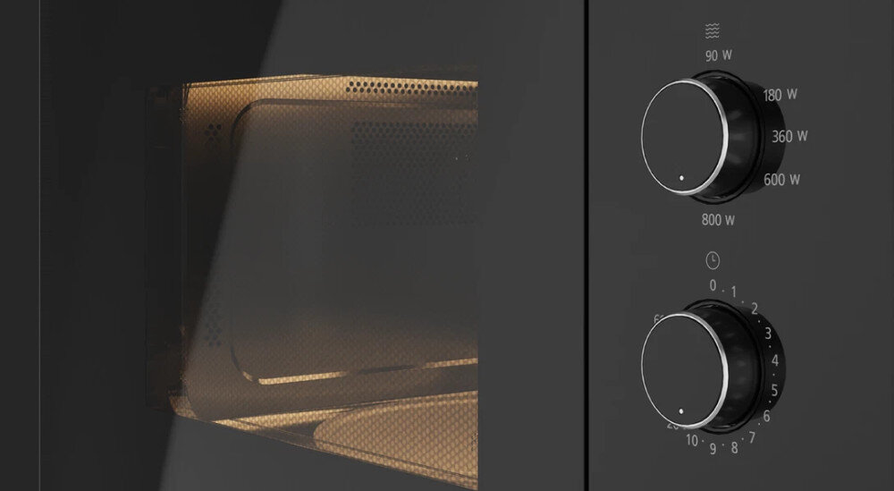 KUCHENKA MIKROFALOWA TEKA ML 820 FI BK Zdjęcie przedstawia zbliżenie na panel sterowania kuchenki mikrofalowej, z widocznymi dwoma pokrętłami oznaczającymi poziomy mocy oraz czas pracy. Obok części sterującej widać fragment podświetlonego wnętrza urządzenia za perforowaną szybą pełna kontrola czasu 95 minut precyzyjne dopasowanie pracy długie procesy gotowania rozmrażanie bez przerw