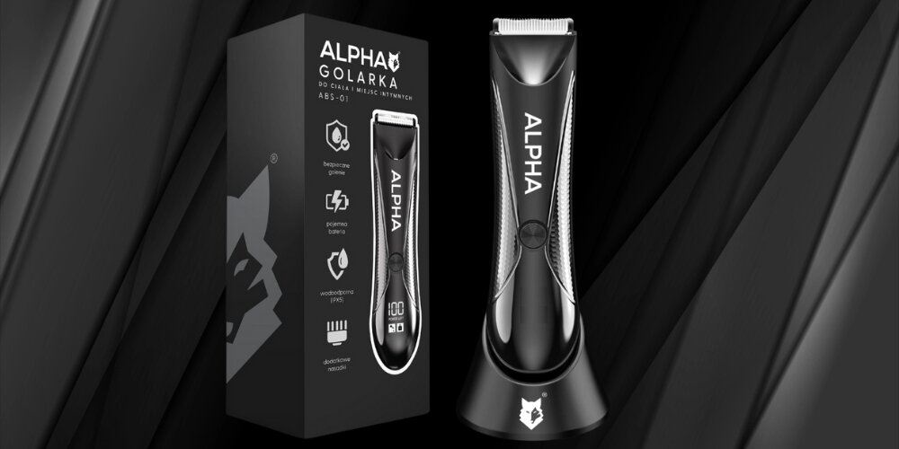 Na obrazie widoczna jest strzyżarka ALPHA ABS-01 0.5-4.5 mm oraz jej opakowanie. Na opakowaniu znajdują się ikony przedstawiające funkcje urządzenia oraz napis \'ALPHA GOLARKA DO CIAŁA - GŁÓWKI I INTYMNYCH ABS-01\'.