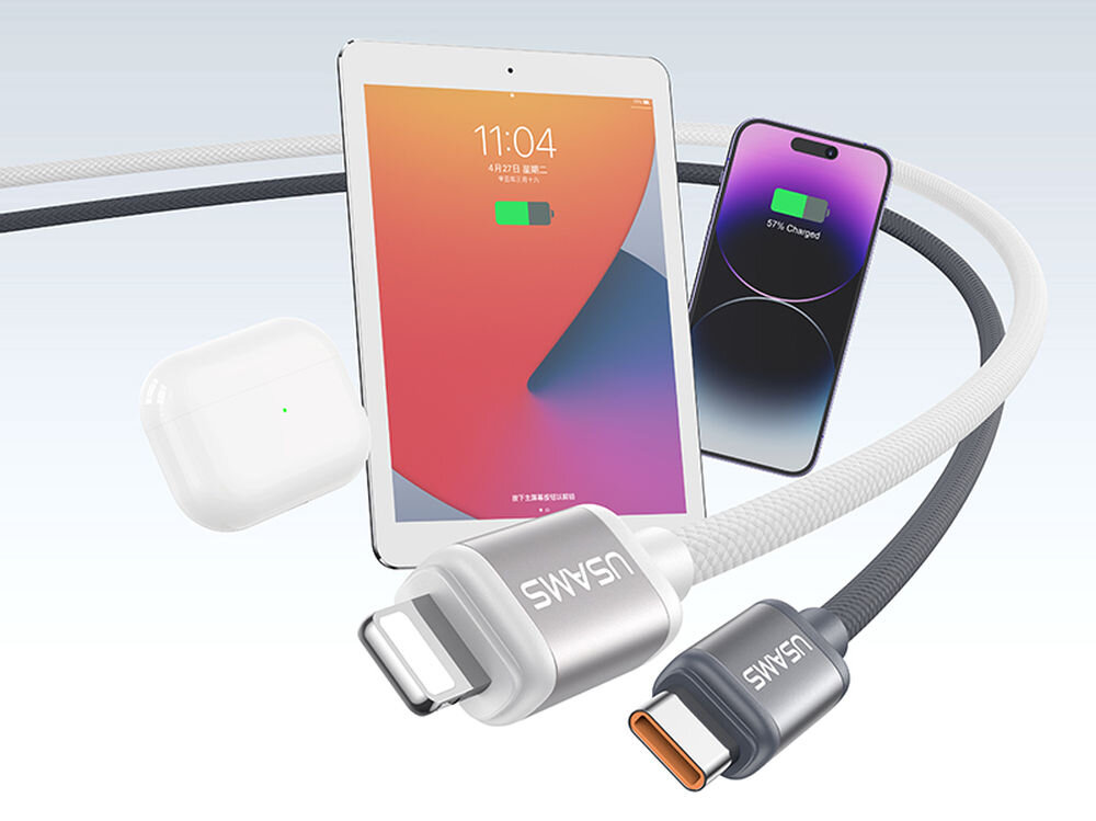 Na obrazie widoczny jest kabel z logo USAMS, tablet, smartfon i etui na słuchawki, wszystkie z ikonami ładowania. Tablet pokazuje godzinę 11:04 i datę 4/12/23.