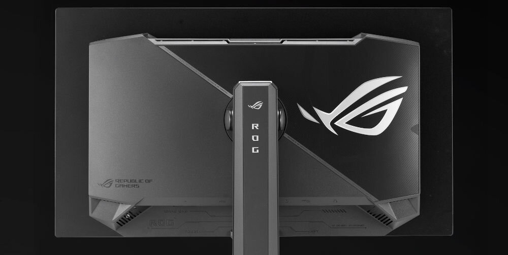 Monitor ASUS ROG Strix XG27ACDMS 26.5 cali 2560x1440px 280Hz 0.03 ms [GTG] Tył monitora z ramieniem mocującym, logo oraz detalami konstrukcyjnymi i brandingiem Republic of Gamers, podstawa, regulacja, pochylenie, wysokość, pivot