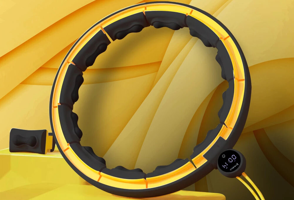 Hula hop HMS HHM21 Czarno-żółty funkcjonalny sprzęt w kazdych warunkach w domu w podróży łatwość składania efektywne wygodne do codziennych treningów poprawa kondycji wzmocnienie mięśni pomoc w modelowaniu sylwetki wygoda mobilność