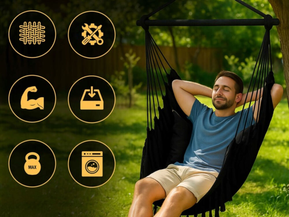 Fotel hamakowy podwieszany BLACK FOREST EX.25296 100 x 130 cm Czarny, wygoda, bujanie, odpoczynek, komfort, w tle ogród, na pierwszym planie mężczyzna na fotelu, obok logotypy zalet fotela