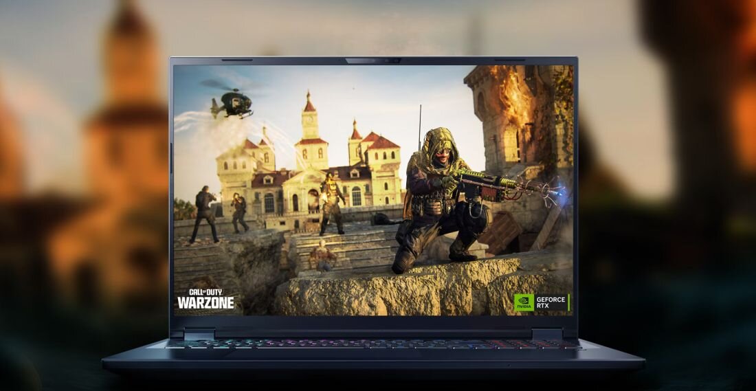  Laptop Predator Helios Neo grafitowy otwarty z grą Call of Duty Warzone na ekranie snajper zamek helikopter, logo GeForce RTX, tło niewyraźne ciepłe - Ekran 18 WQXGA i częstotliwość odświeżania 165 Hz 