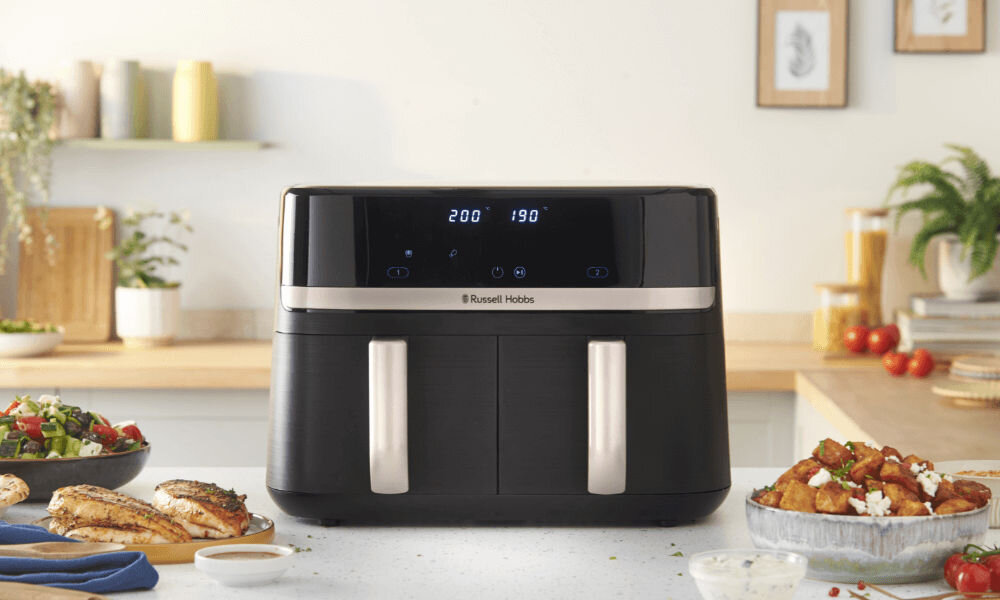 Air Fryer Frytkownica beztłuszczowa RUSSELL HOBBS SatisFry DualBaske 27680-56 białe tło połowa piekarnika oddzielenie połowa frytkownicy oszczędność nawet do 43% energii korzyść dla środowiska odczuwalne oszczędności w domowym budżecie efektywne gotowanie zachwyt rezultatem komfort wydajność