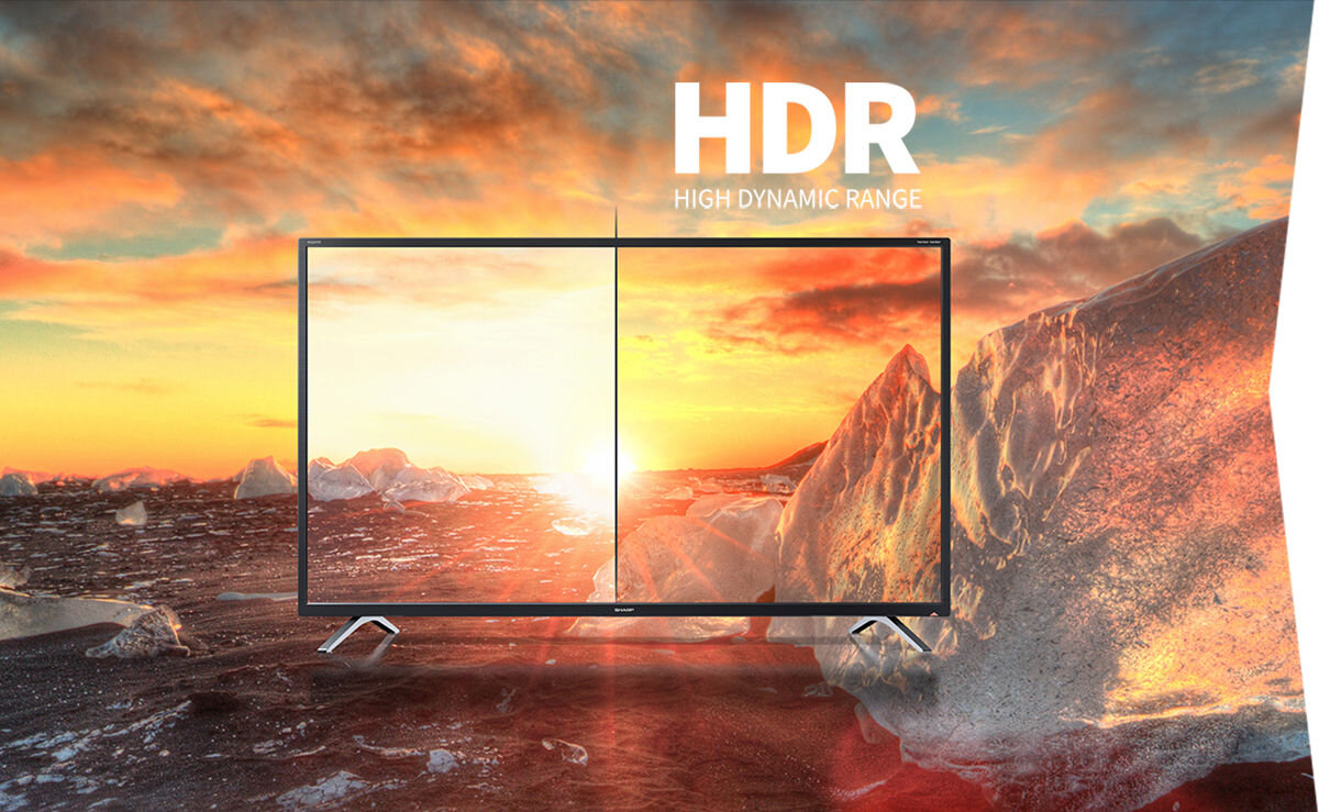 Telewizor SHARP 24HF2765E HDR10 obraz kontrastowy naturalne kolory, telewizor od frontu przy wschodzie słońca