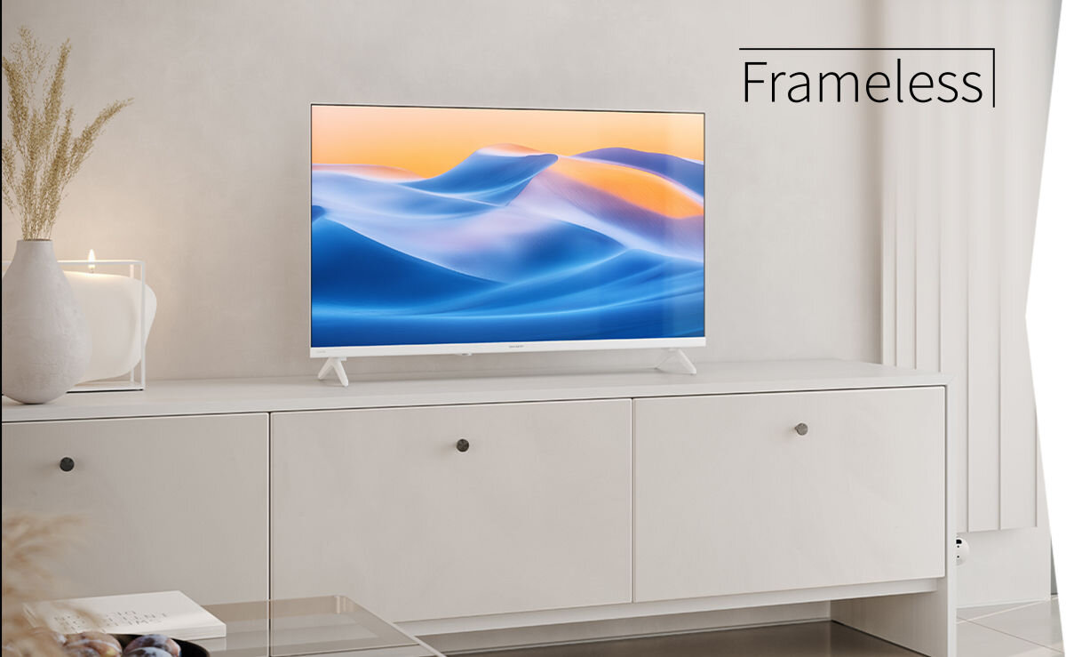 Telewizor SHARP 32HF2765EW bezramkowy design estetyczna konstrukcja, telewizor na postumencie w pomieszczeniu
