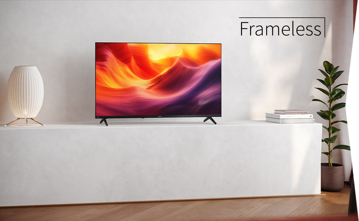 Telewizor SHARP 40HF3765E bezramkowy design estetyczna konstrukcja, telewizor na postumencie w pomieszczeniu