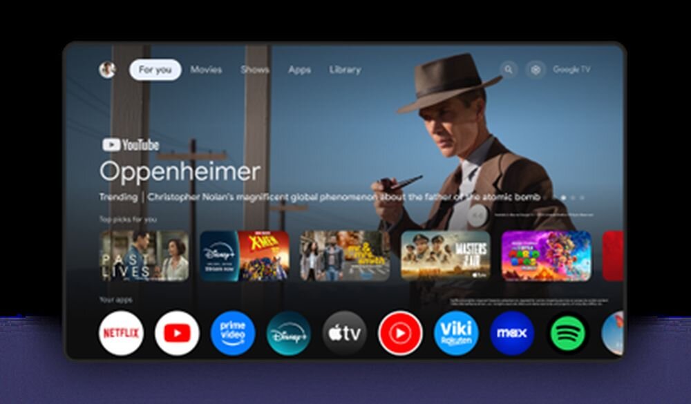 XIAOMI Mi TV Stick 2nd Gen Google TV, Asystent Google, integracja aplikacji i streaming, kadr obraz z włączonym ekranem startowym telewizora