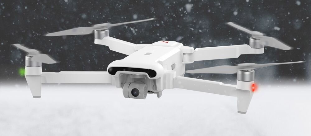 Dron Xiaomi Fimi X8 SE 2022 bateria lot sterowanie akrobacje czas lotu zasięg funkcje lądowanie kamera rozdzielczość filmy zdjęcia nagrywanie jakość ładowanie aplikacja przesył pilot śmigła stabilizacja fotografia waga wymiary konstrukcja obudowa korpus ramiona silnik